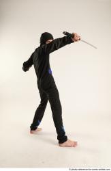 Man Young Athletic Fighting with sword Standing poses Casual Asian